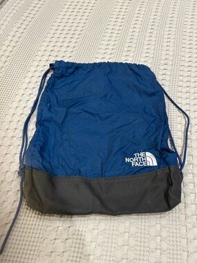 The North Face Blue and Black Drawstring Pack